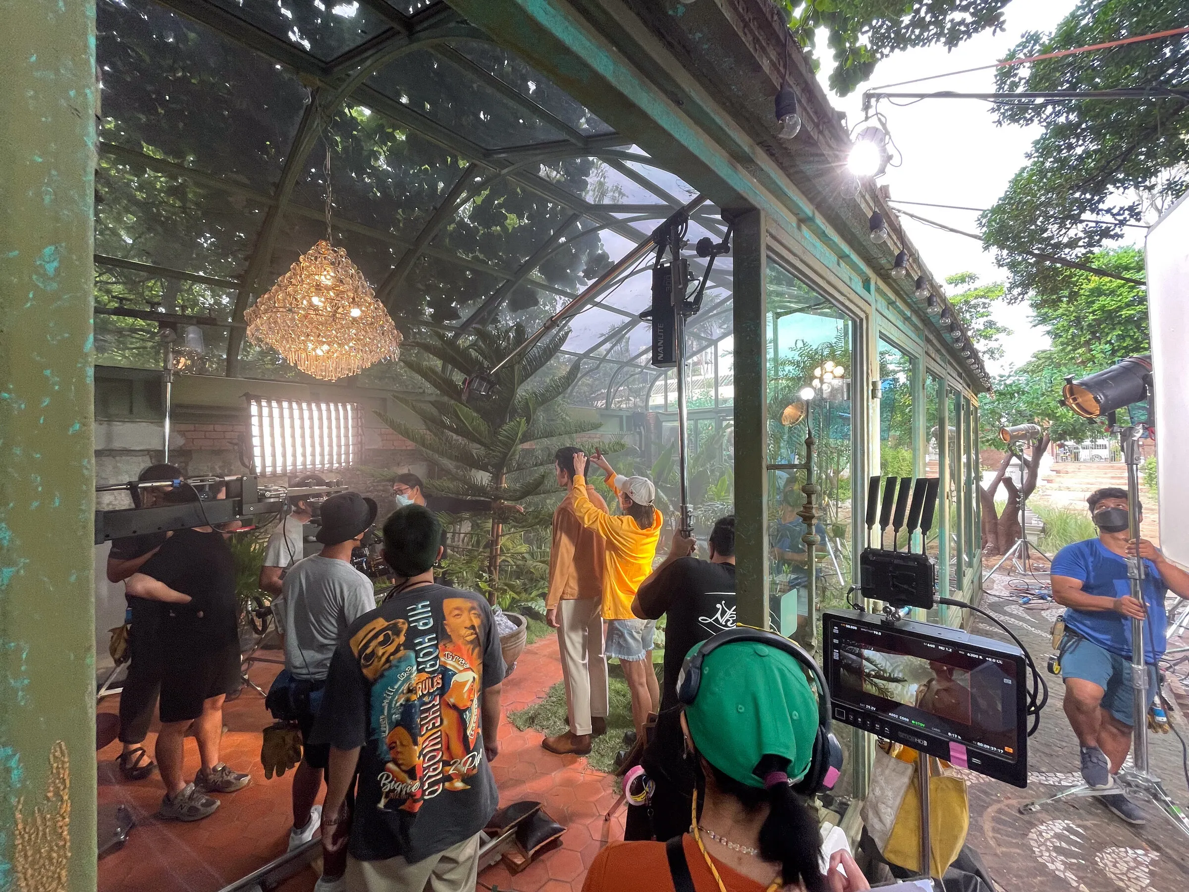 Alphascience commercial: greenhouse location dressed with a chandelier