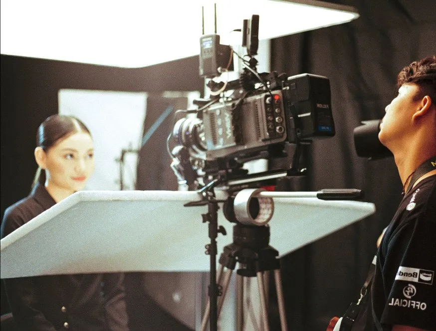 Cinema camera rig on a studio shoot with an actress