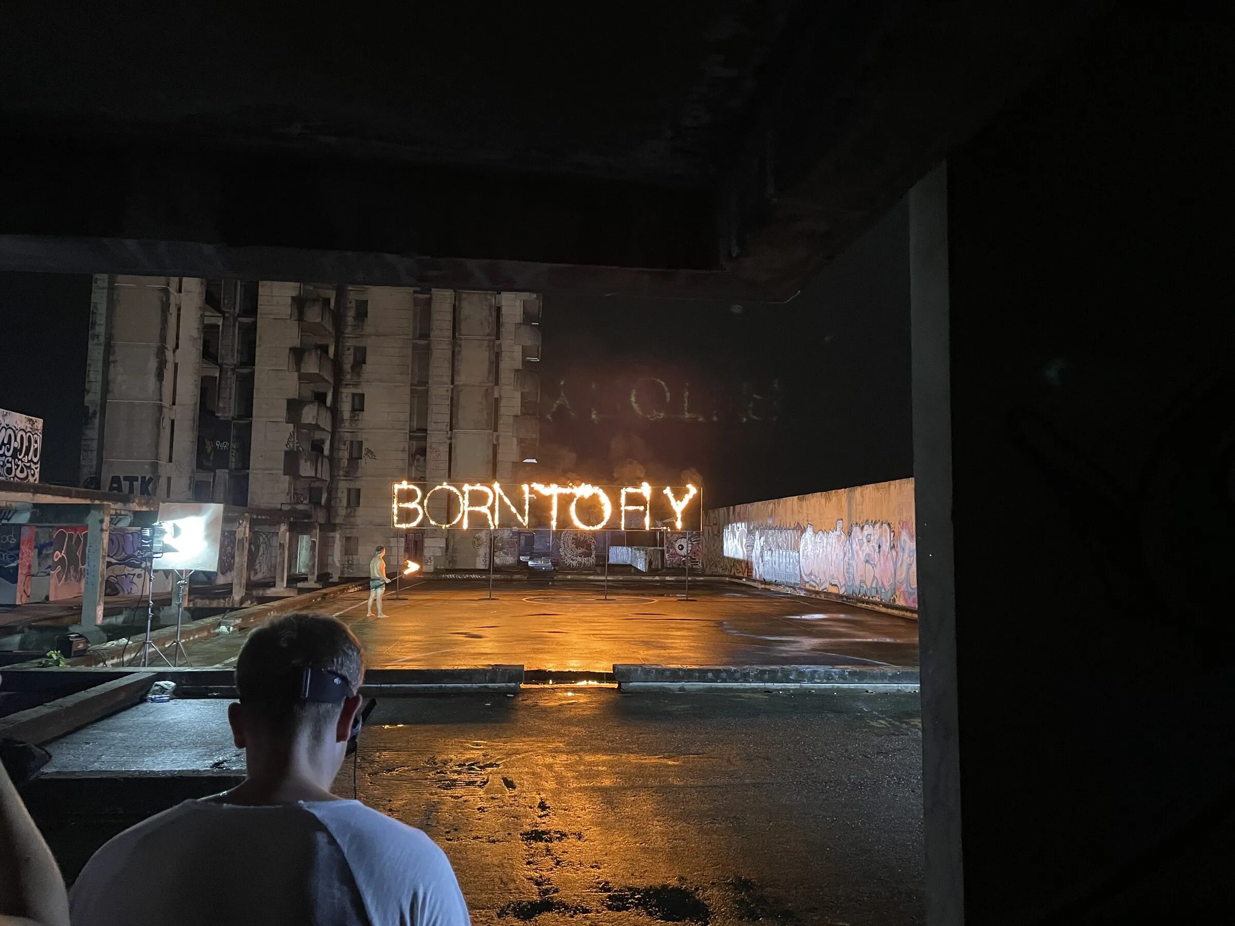 DJI Born to Fly shoot: neon sign on a night set
