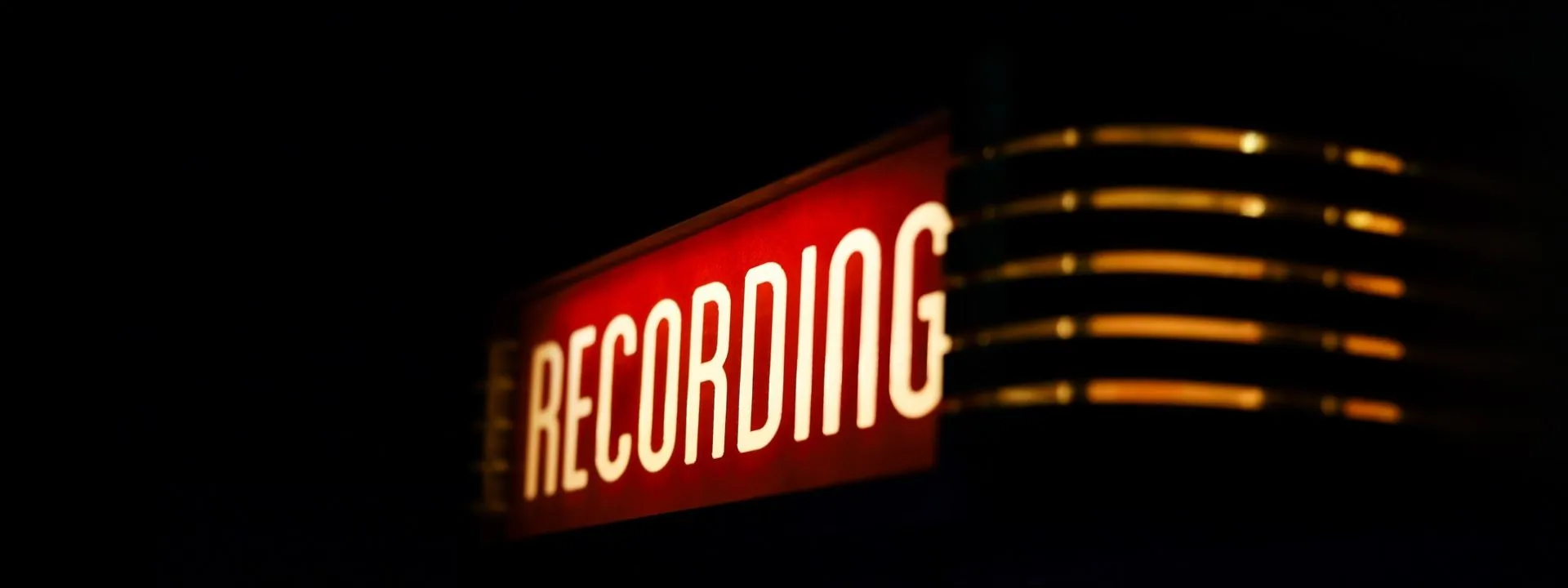 Illuminated recording sign in a voice-over studio