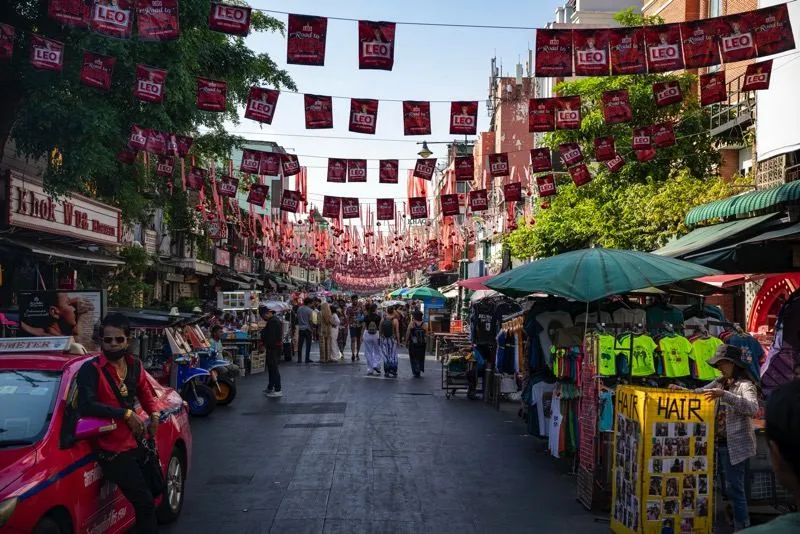 Film location scouted by Bangkok Production Company in Thailand: market street under red lanterns