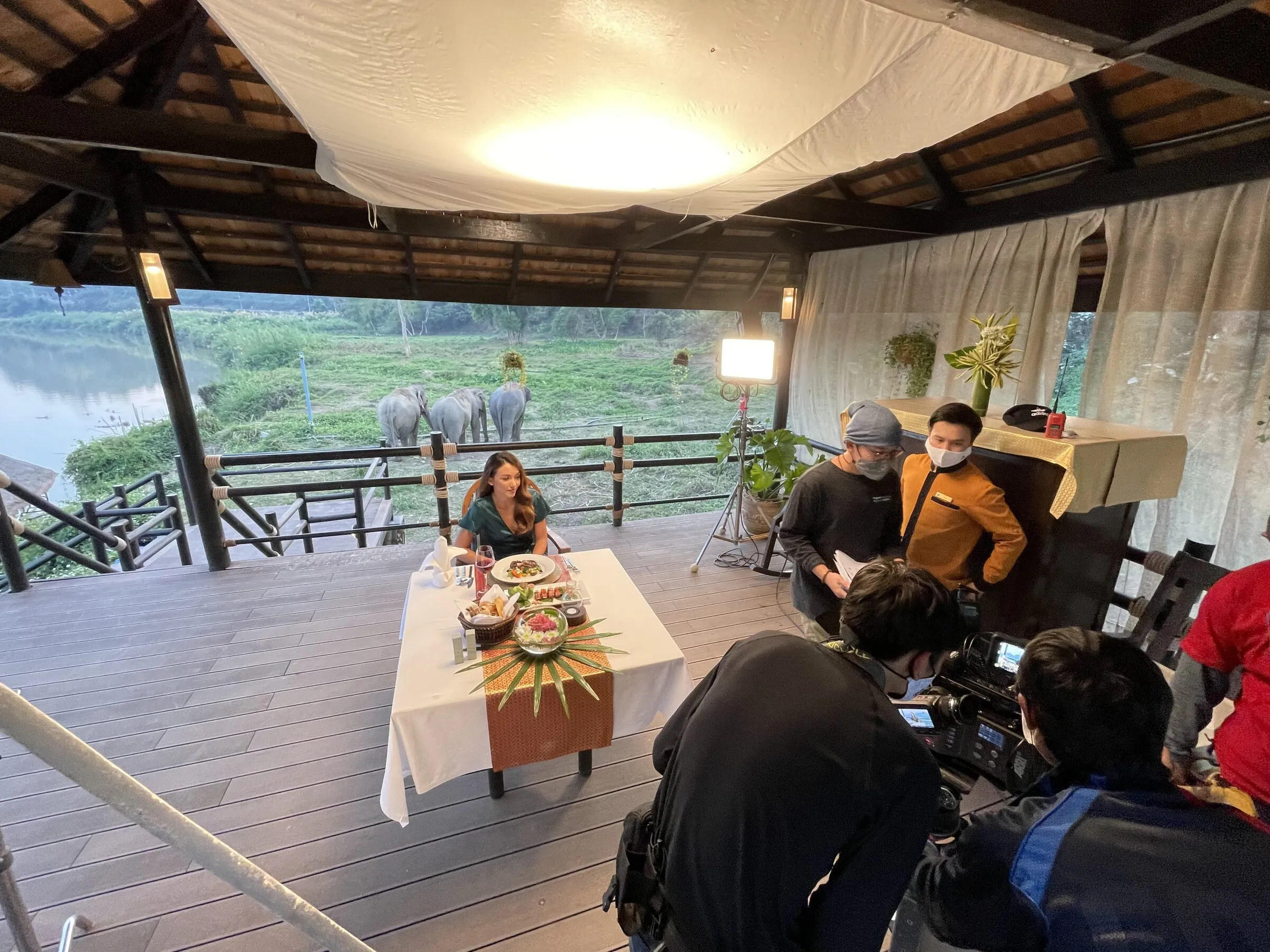 Omaze shoot: dressed table on a riverside deck at Anantara