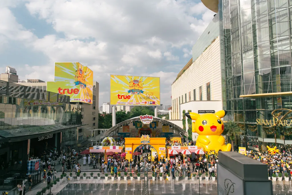 Siam Paragon LED screens over a crowd
